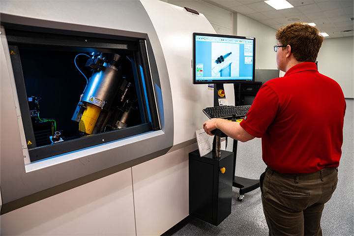 LP_Img_Industrial-Scanning_Quote Applications engineer CT scanning an automotive carburetor
