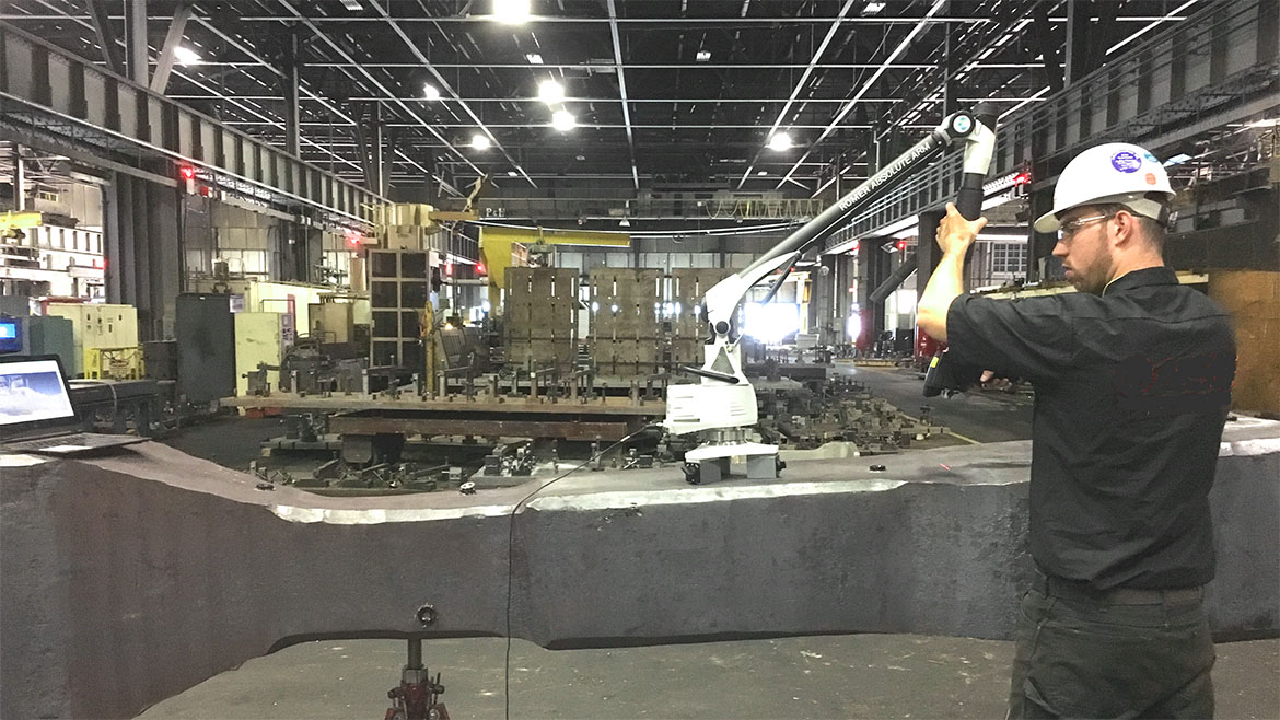 QM0925-OO-Manage-InPlace-Machining-p5-Metrologist-uses-articulated-arm-in-mill Metrologist uses articulated arm in mill